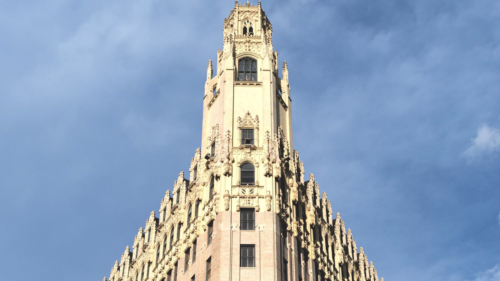 Gothic Revival tower rising over downtown San Antonio