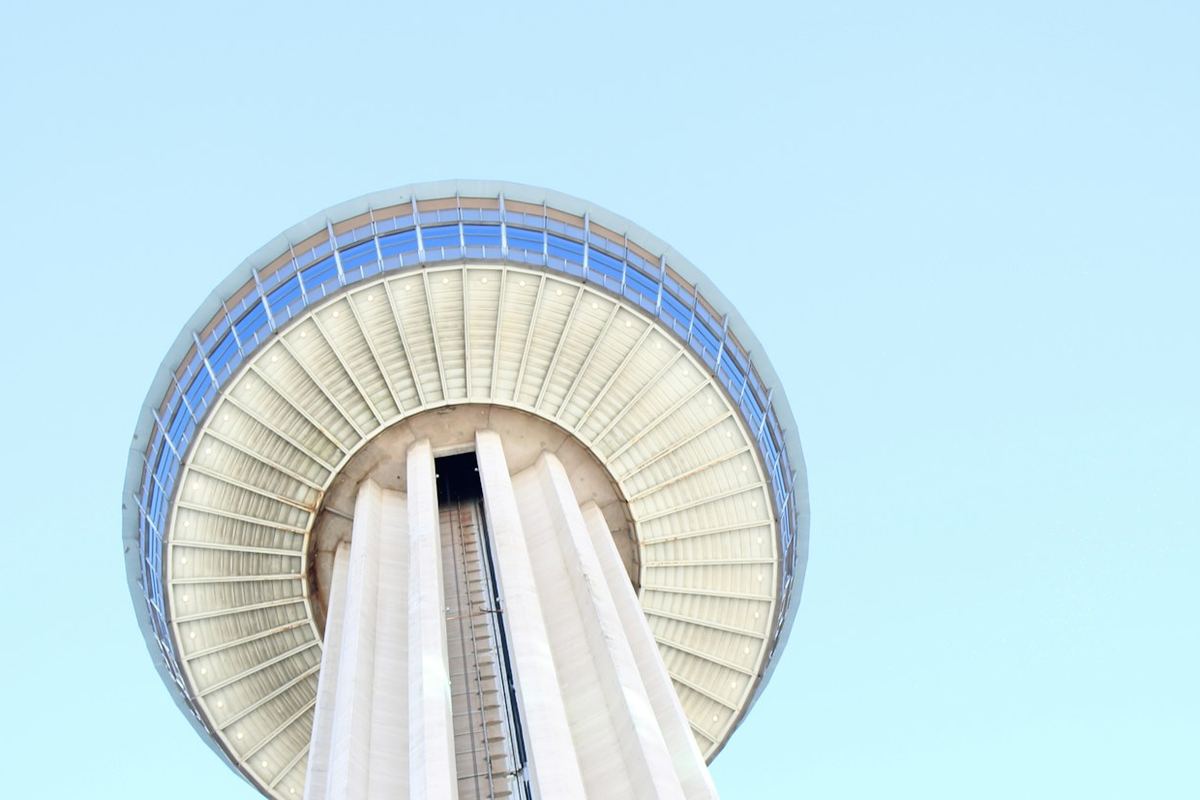 The observation deck of the Tower of the Americas seen from directly below
